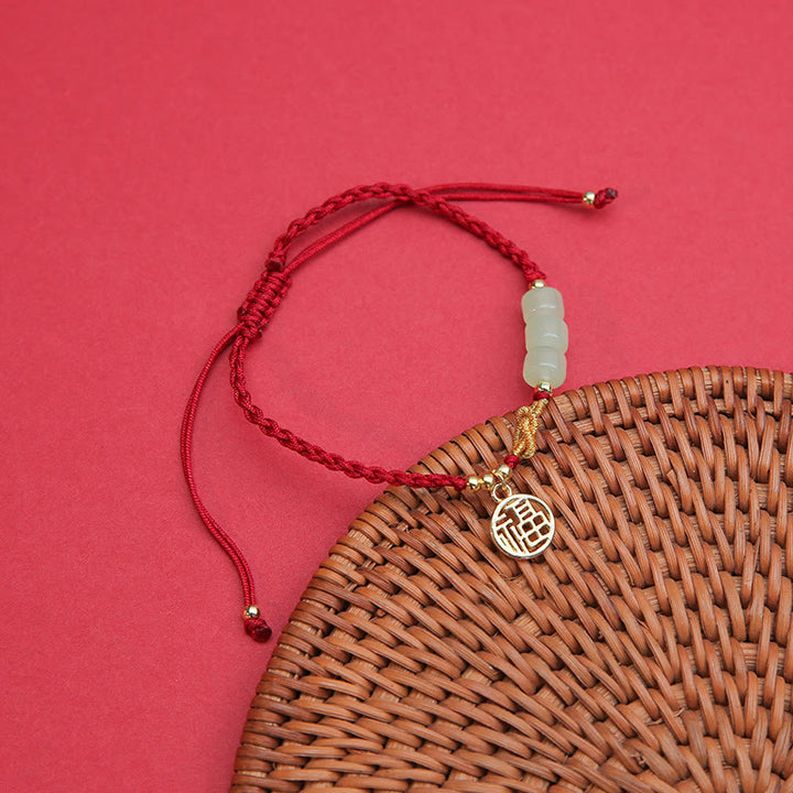 Pulsera de cuerda roja de la suerte con dije de personaje Fu con cuentas de jade hechas a mano con Buddha Stones