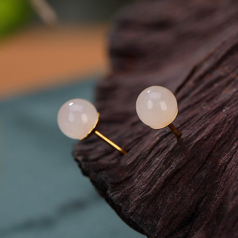 Pendientes de tuerca con bendición de jade blanco redondo de plata de ley 925 con Buddha Stones