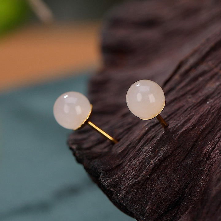 Pendientes de tuerca con bendición de jade blanco redondo de plata de ley 925 con Buddha Stones