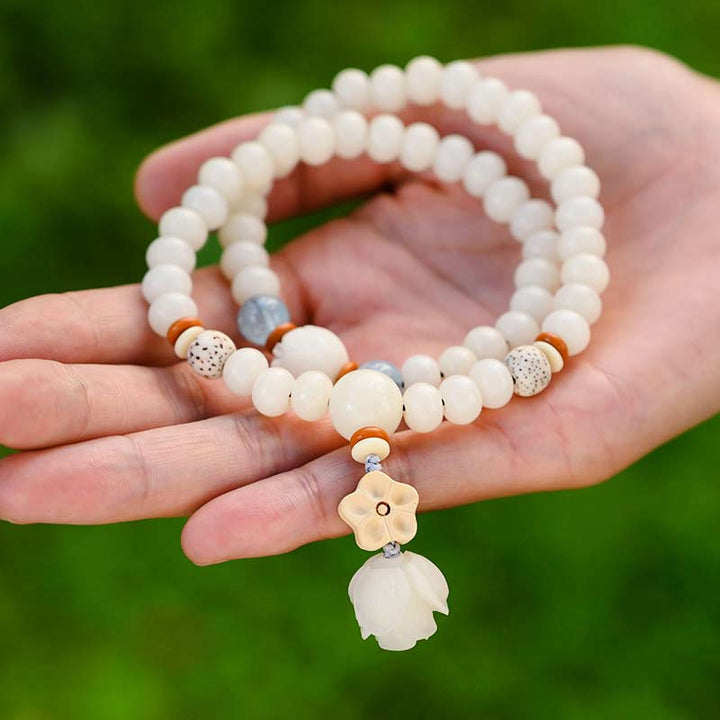 Pulsera de bendición de loto Bodhi de jade blanco tibetano con Buddha Stones