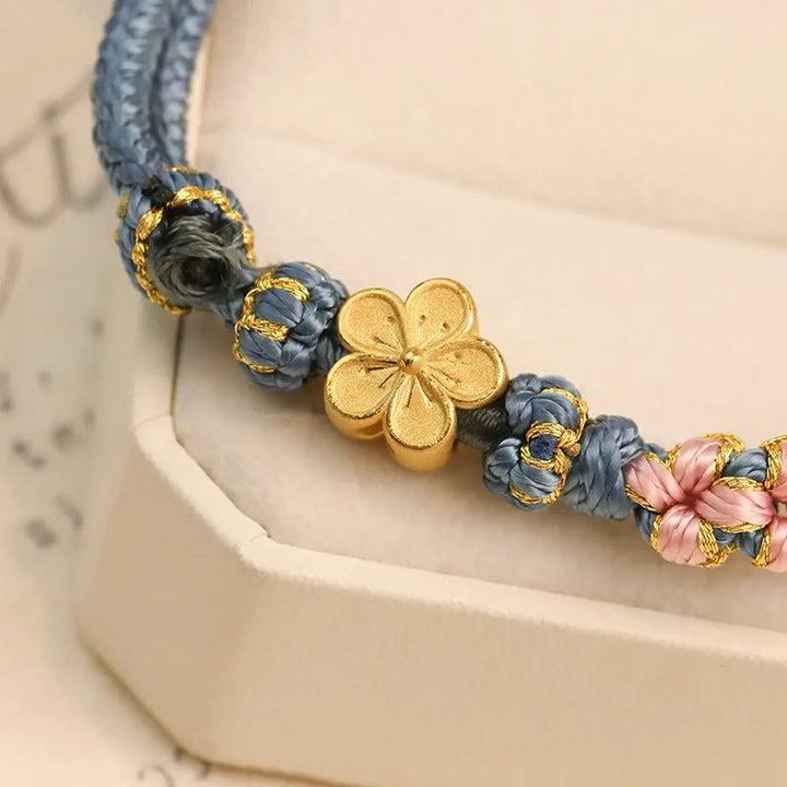 Pulsera de hilo de riqueza con diseño de flor de durazno
