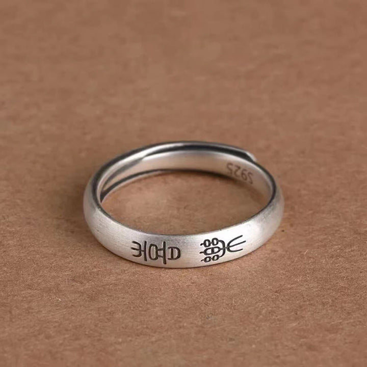 Anillo de riqueza de la suerte de cobre de paz y alegría