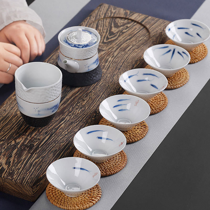 Buddha Stones Vintage ciruela orquídea bambú crisantemo loto pez Koi taza de té de cerámica tazas de té Kung Fu
