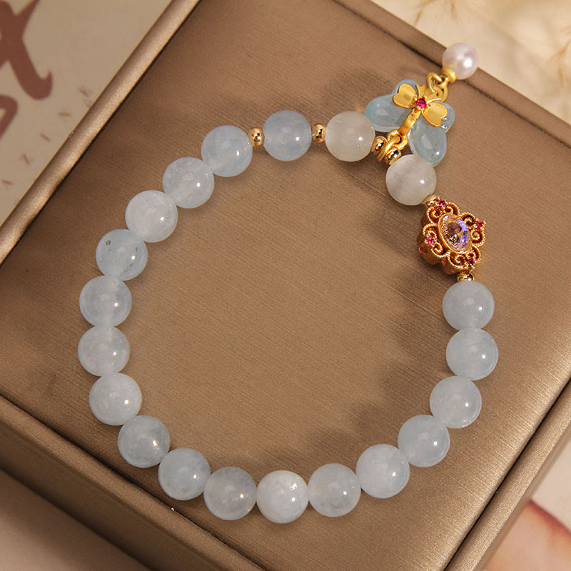 Pulsera con dije de perlas y mariposas curativas con ojo de gato, aguamarina y Buddha Stones