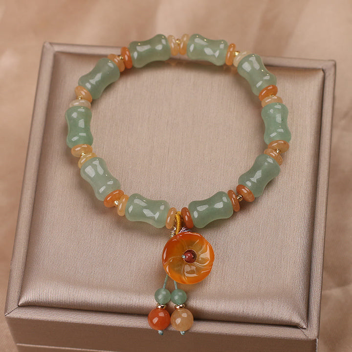 Pulsera de la suerte con patrón de flores de bambú y jade natural de Buddha Stones