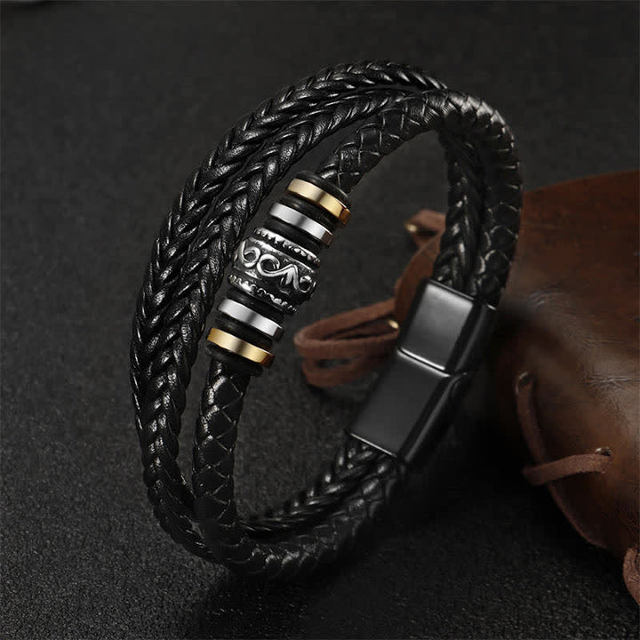 Pulsera trenzada con equilibrio de acero y titanio en capas de cuero con Buddha Stones