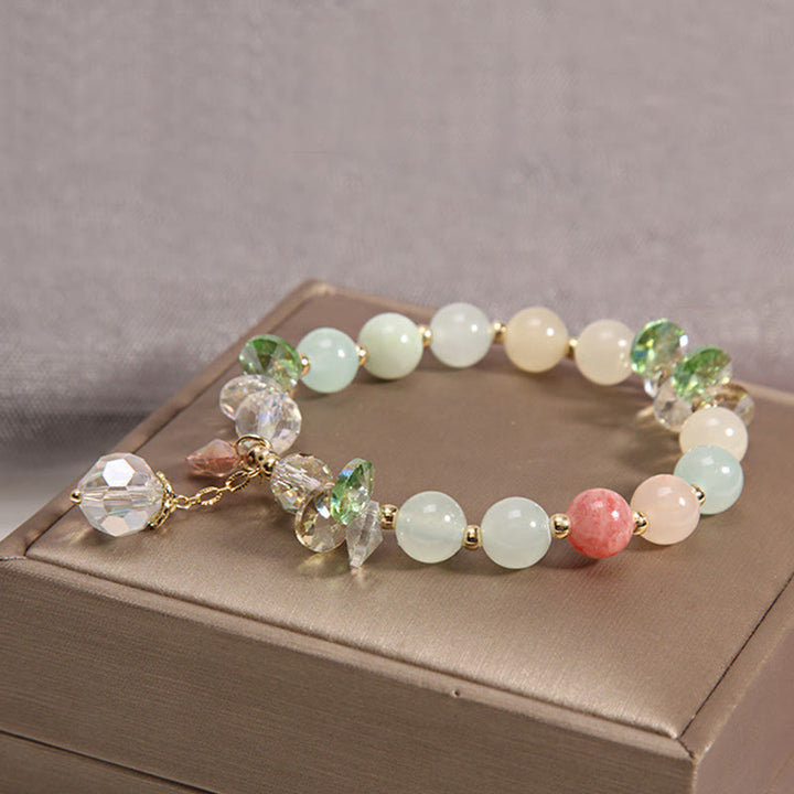Pulsera con dije de paz y cristal rosa con ojo de gato y Buddha Stones - image 8