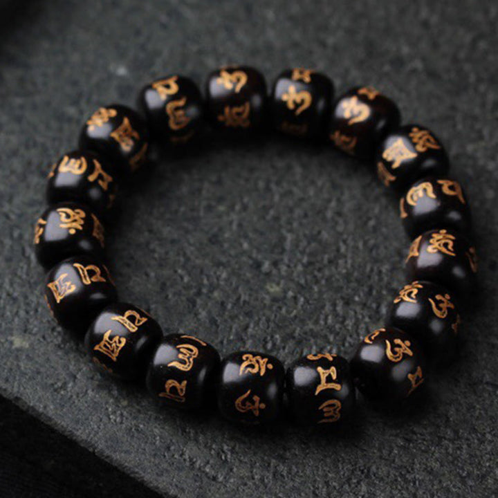 Pulsera de la paz grabada con Buddha Stones, madera de ébano tibetano, Om Mani Padme Hum