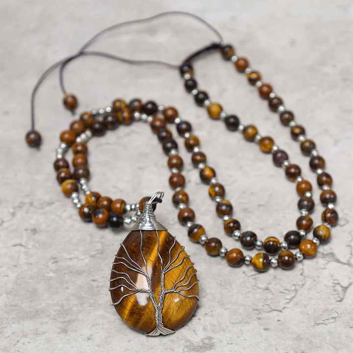 Collar con colgante de cuentas de fuerza de ojo de tigre natural de Buddha Stones