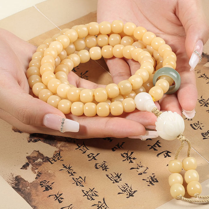 Pulsera con dije de armonía y paz con cuentas de loto y semilla de Bodhi Natural de Buddha Stones