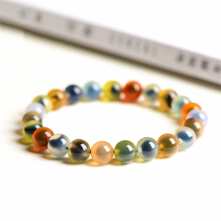 Pulsera de cuentas de fuerza de armonía de ágata de caramelo colorida natural de Buddha Stones