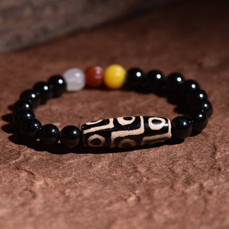 Pulsera de poder de riqueza con cuentas Dzi de nueve ojos naturales tibetanas de Buddha Stones