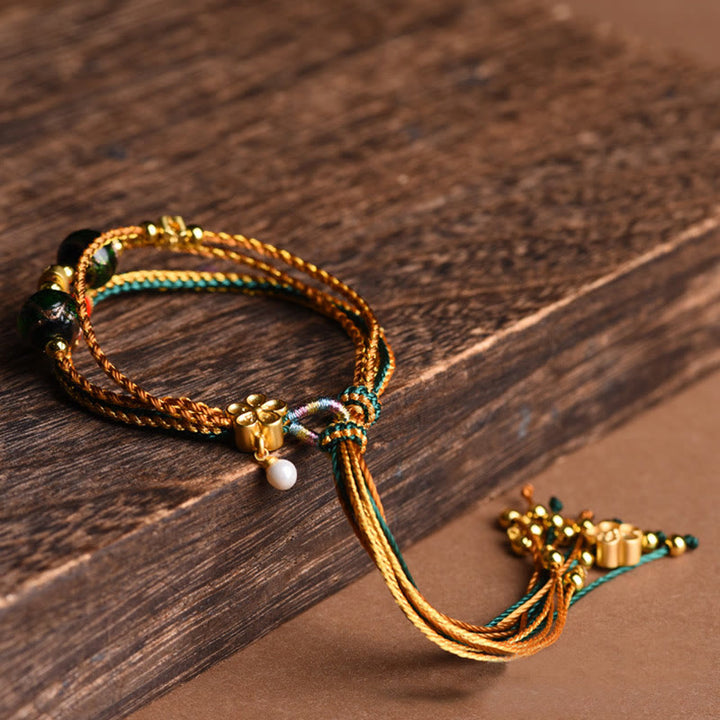 Pulsera curativa multicapa trenzada con cuentas de vidrio Liuli de cuerda hecha a mano tibetana con Buddha Stones
