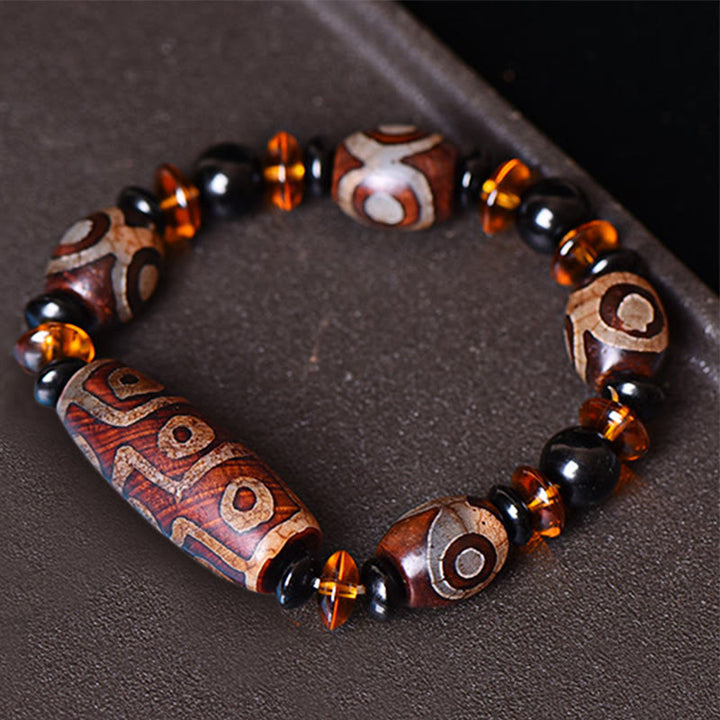 Pulsera de bendiciones de cuentas Dzi de nueve ojos naturales retro tibetanas de Buddha Stones