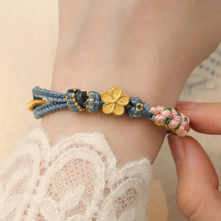 Pulsera de hilo de riqueza con diseño de flor de durazno