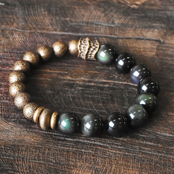 Pulsera de transformación positiva con cuentas de cobre y obsidiana arcoíris de Buddha Stones