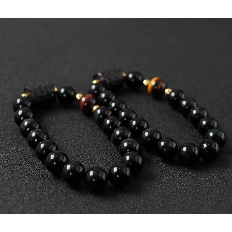 Pulsera de pareja de fuerza de ojo de tigre rojo de madera de ébano de obsidiana negra