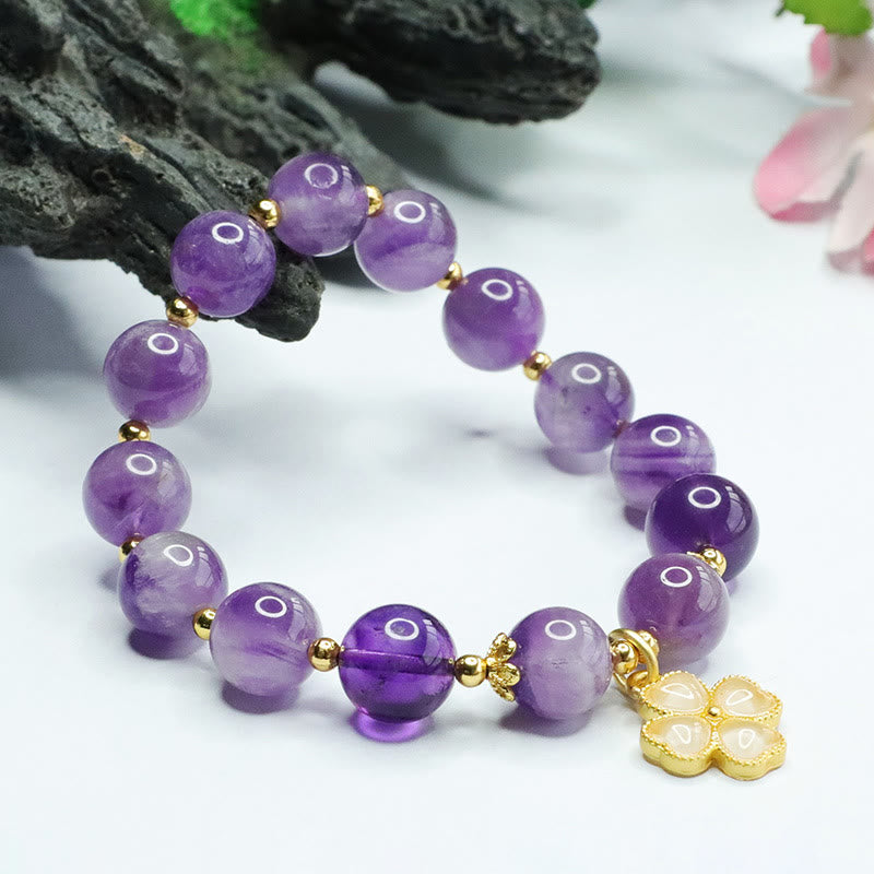 Pulsera con dije de trébol de cuatro hojas y paz interior de cristal de amatista natural con piedras de Buddha Stones