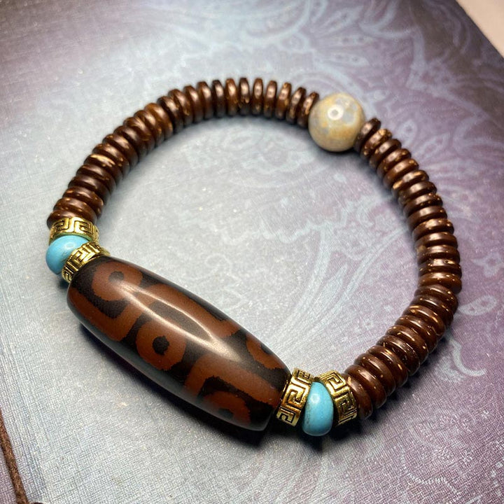 Pulsera de riqueza de cuentas Dzi tibetanas de nueve ojos con Buddha Stones