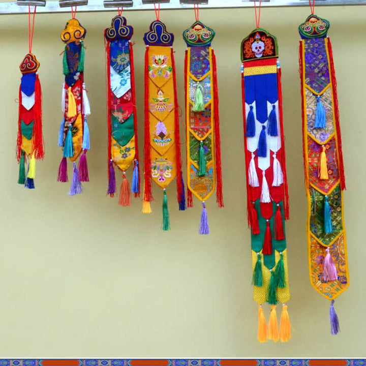 Flor de loto Ocho símbolos auspiciosos Meditación Iluminación Borlas coloridas Arte de pared