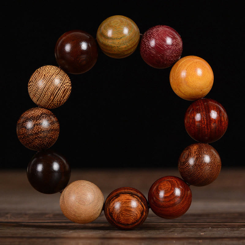 Pulsera curativa de protección de sándalo multicolor con Buddha Stones