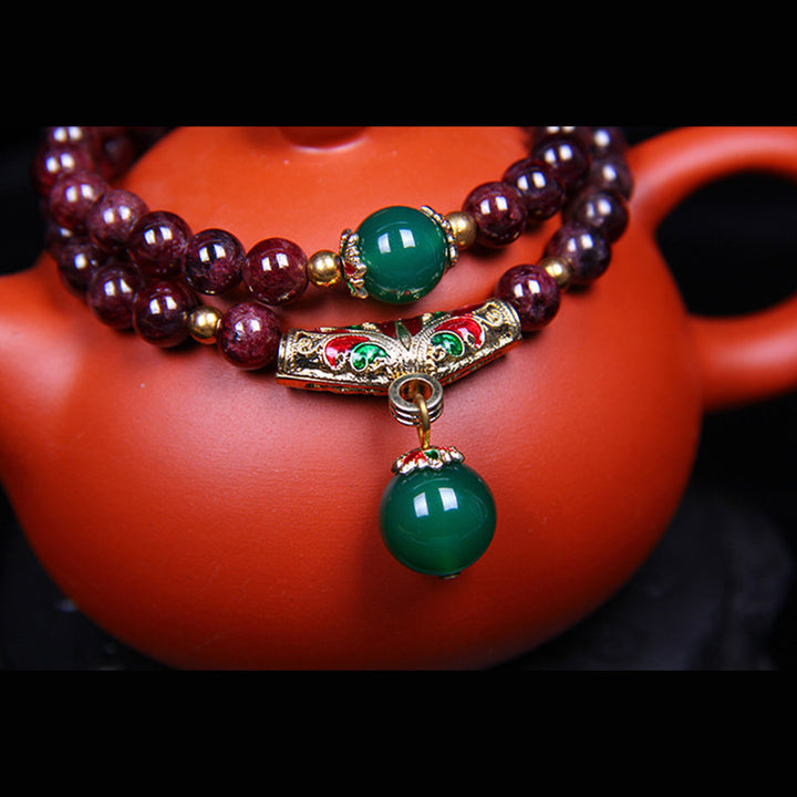 Pulsera de bendición de granate natural con Buddha Stones
