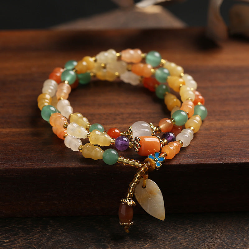 Pulsera de riqueza de calabaza de jade de seda dorada con Buddha Stones