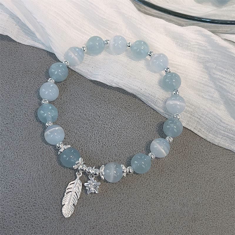 Pulsera con dije de estrella y plumas curativas de ojo de gato, aguamarina, plata de ley 925 con Buddha Stones - image 1