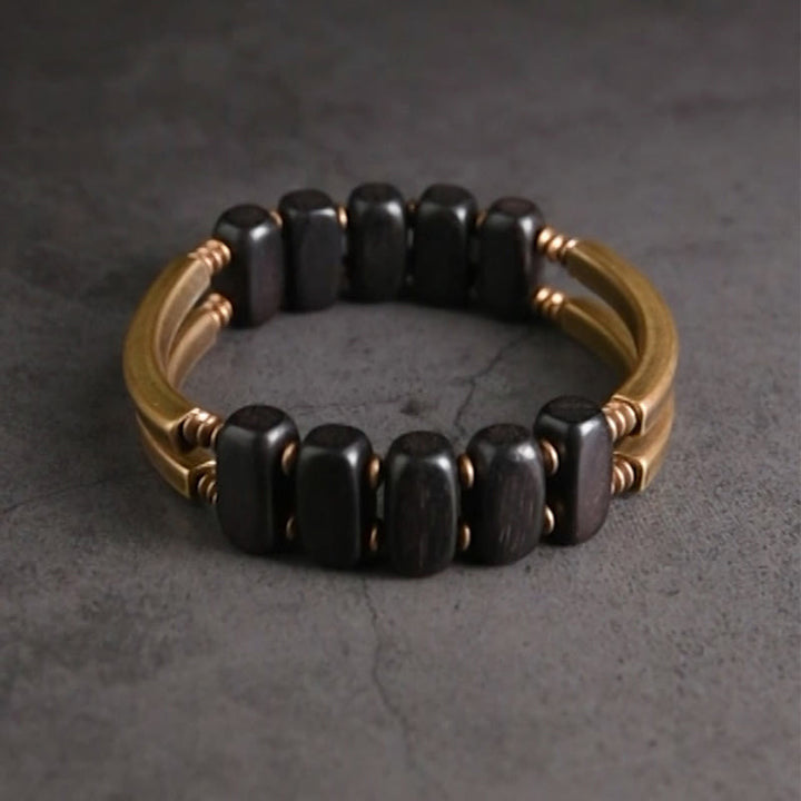 Pulsera de equilibrio de doble capa con Buddha Stones, madera de ébano tibetano, latón y cobre - image 1