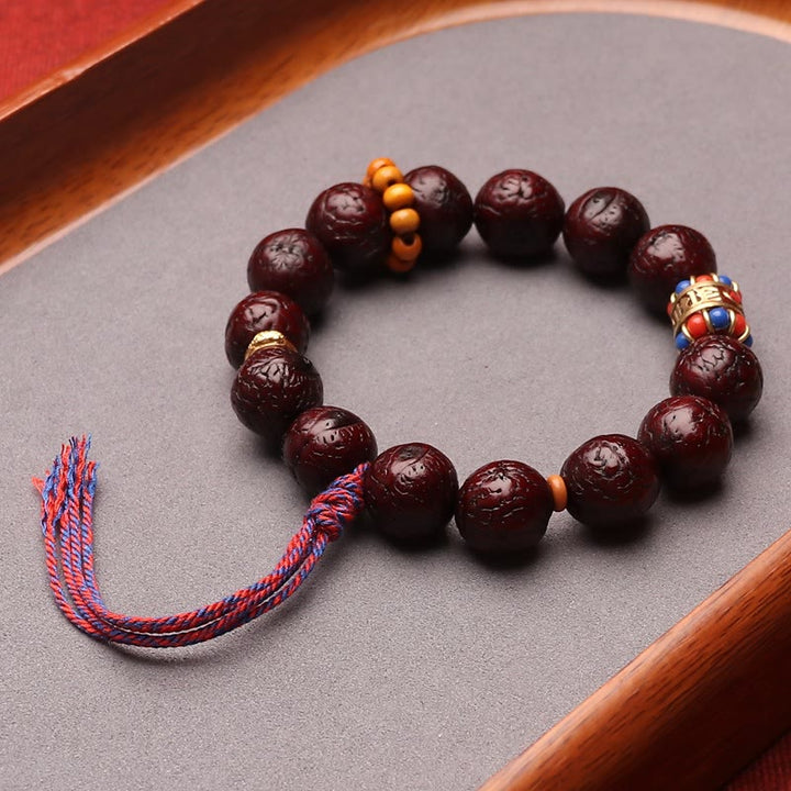 Pulsera con borlas de paz y calma con cuentas de semillas Bodhi de Buddha Stones