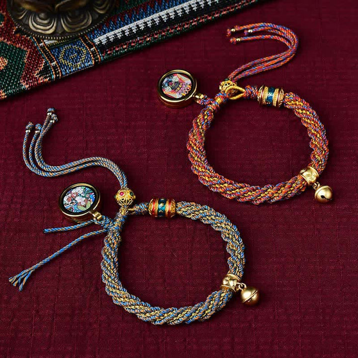 Pulsera de cuerda trenzada con dije de campana y rueda de oración Thangka de protección de la suerte hecha a mano tibetana