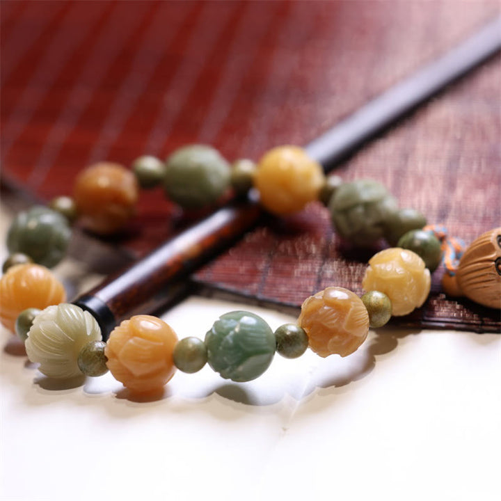 Pulsera de armonía de sabiduría de sándalo verde de loto con semillas de Bodhi de Buddha Stones