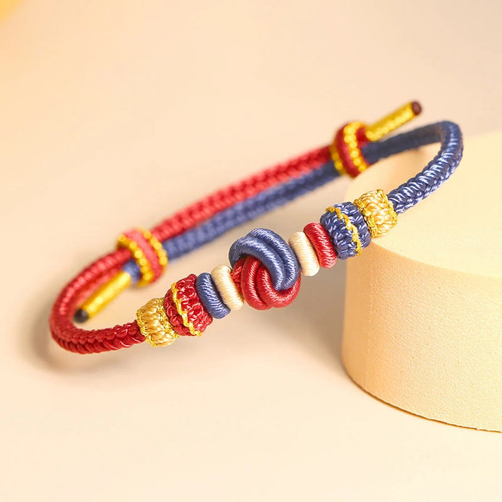 Pulsera de conexión de suerte con nudo de paz de ocho hilos hecha a mano con cuerda de dos colores con Buddha Stones
