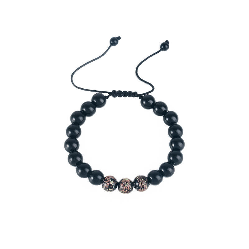 Pulsera de fuerza con piedra luminosa luminosa de obsidiana negra de Buddha Stones
