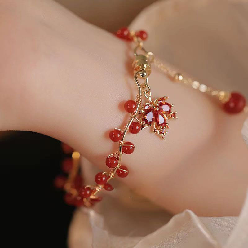 Pulsera con amuleto de la suerte de hoja de arce roja con Buddha Stones