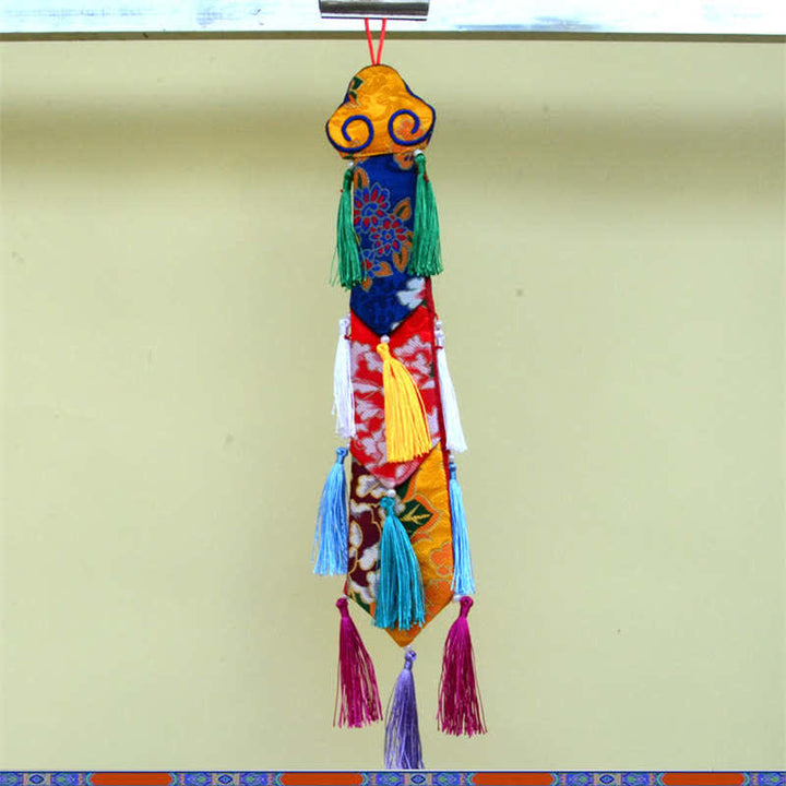 Flor de loto Ocho símbolos auspiciosos Meditación Iluminación Borlas coloridas Arte de pared