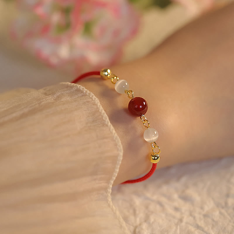Pulsera de confianza con hilo trenzado y ojo de gato de ágata roja con Buddha Stones - Ágata roja e hilo rojo (pulsera de 15 + 5 cm) - image 1