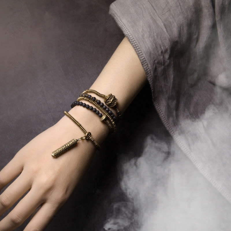 Pulsera multicapa curativa de cobre y roca de lava vintage con Buddha Stones