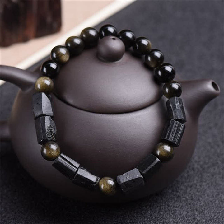 Pulsera de riqueza de turmalina negra obsidiana con brillo dorado de Buddha Stones