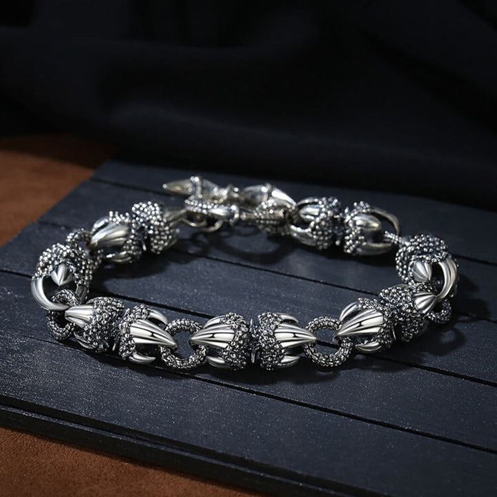 Pulsera de protección de fuerza grabada con garra de dragón de Buddha Stones