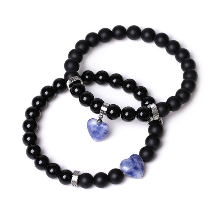 Buddha Stones 2 piezas de piedra de cristal de ónix negro amor protección del corazón pulsera de pareja