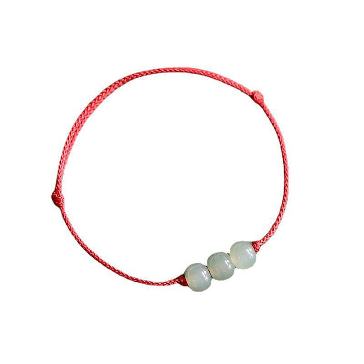 Pulsera de tejido de hilo de la suerte de jade con tres cuentas de piedras de Buddha Stones