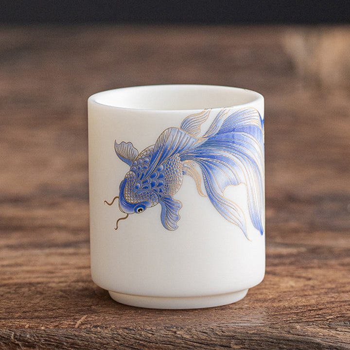 Taza de té de cerámica de porcelana blanca, pez Koi, Buddha Stones, taza de té de Kung Fu