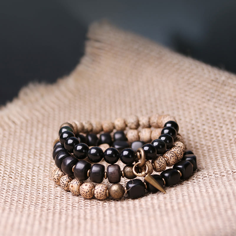 Pulsera de paz de cobre y madera de ébano, obsidiana negra, semilla de Bodhi tibetana, Buddha Stones