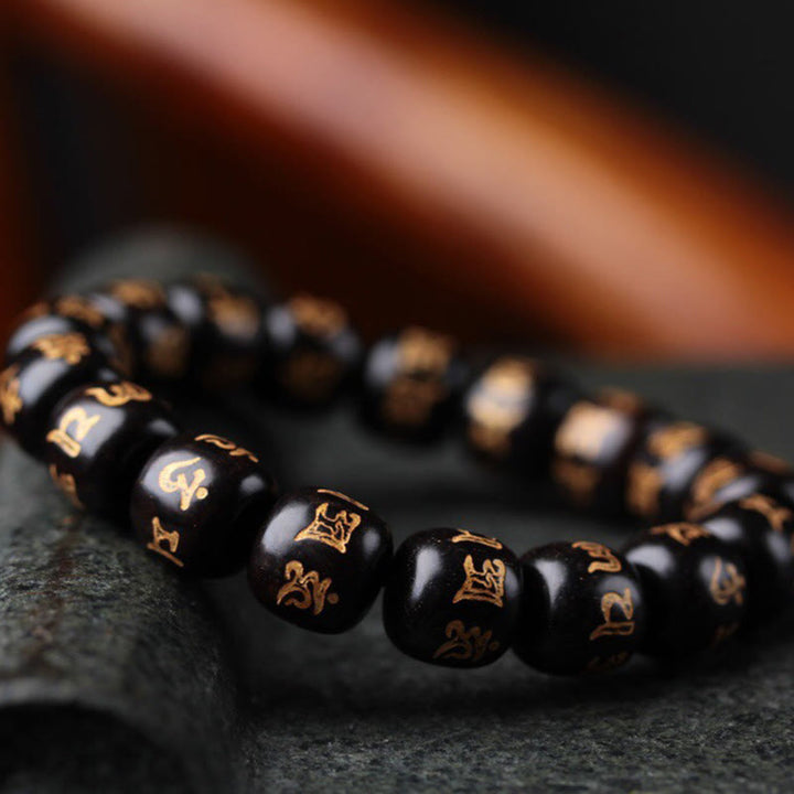 Pulsera de la paz grabada con Buddha Stones, madera de ébano tibetano, Om Mani Padme Hum