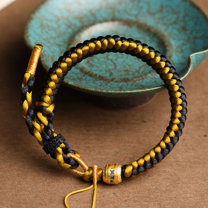 Pulsera de pureza Om Mani Padme Hum de cuerda de dragón de oro negro tibetano hecha a mano con Buddha Stones