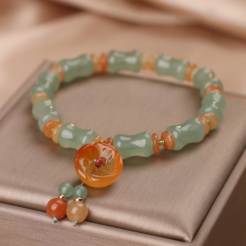 Pulsera de la suerte con patrón de flores de bambú y jade natural de Buddha Stones