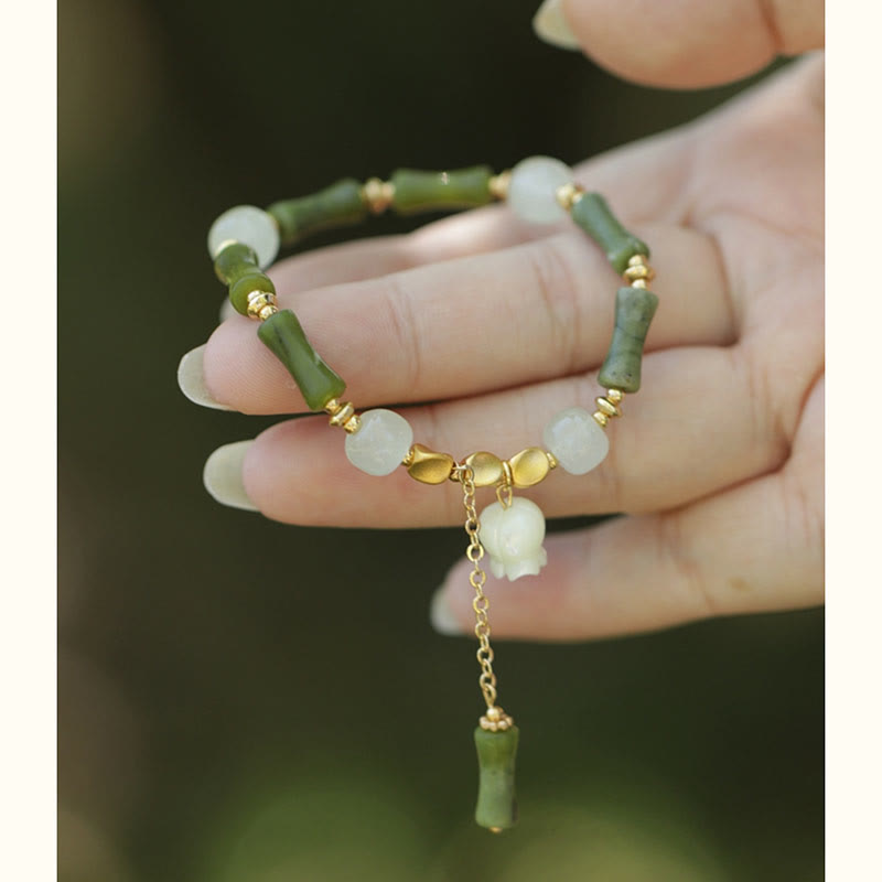Pulsera de riqueza con Buddha Stones, bambú verde, jade, lirio de los valles