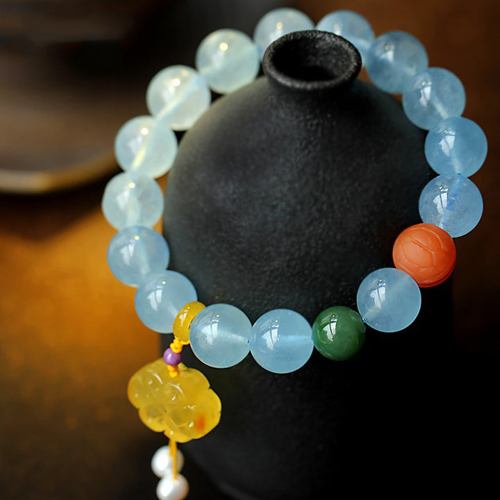 Pulsera de la paz con dije anudado chino, ámbar, aguamarina natural