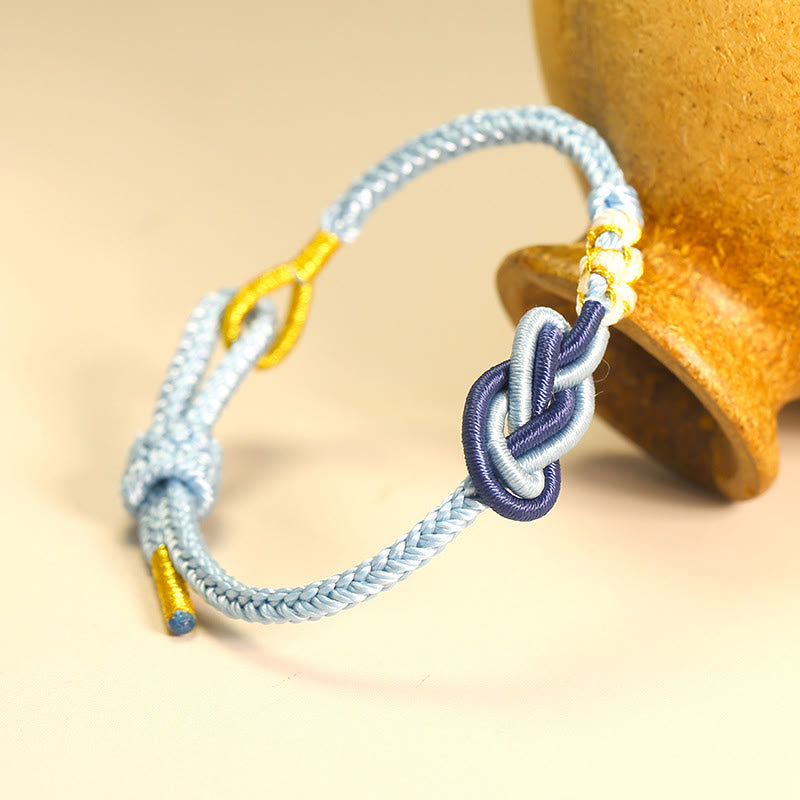 Pulsera de conexión de suerte con nudo de flor de melocotón, nudo de paz de ocho hilos hecho a mano con Buddha Stones